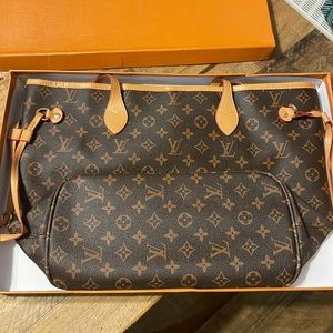 Brown tote with matching clutch.